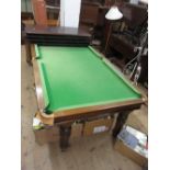 Early 20th Century mahogany quarter size snooker dining table by Riley, the removable four piece top