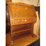 Small Arts and Crafts oak bureau, carved spinning chair and two occasional tables