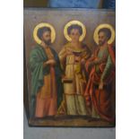 Antique Continental icon on panel, portrait of three Saints, extensively inscribed, 13.5ins x 10.