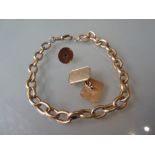 9ct yellow gold part Albert watch chain, 9ct gold dress stud and a single 9ct gold cufflink It is
