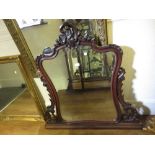 19th Century French carved rosewood overmantel mirror with shaped bevelled plate 43ins wide x