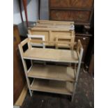 Group of six painted beechwood folding open bookcases