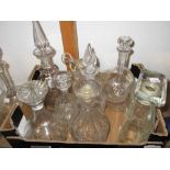 Box containing a quantity of various 19th Century and later cut glass decanters including a pair