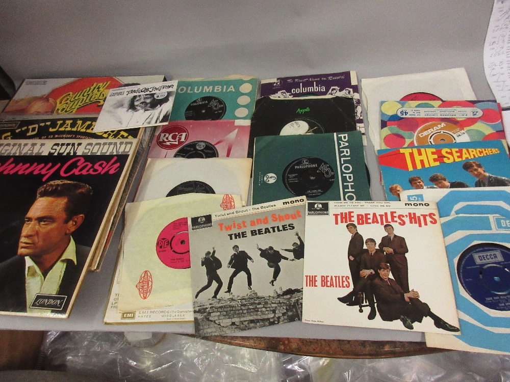 Small quantity of 45 speed records including The Beatles Hits, Twist and Shout and others