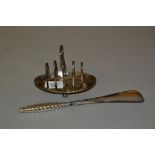 Birmingham silver four division toast rack on oval stand and a silver handled shoe horn