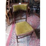 Edwardian line inlaid mahogany nursing chair on turned supports and an early 20th Century folding