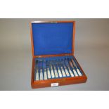 Mahogany cased set of mother of pearl handled silver plated dessert knives and forks (at fault)