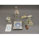 Four various Lladro figures, a Nao group, a boxed Wedgwood small dish and a composite figure of John