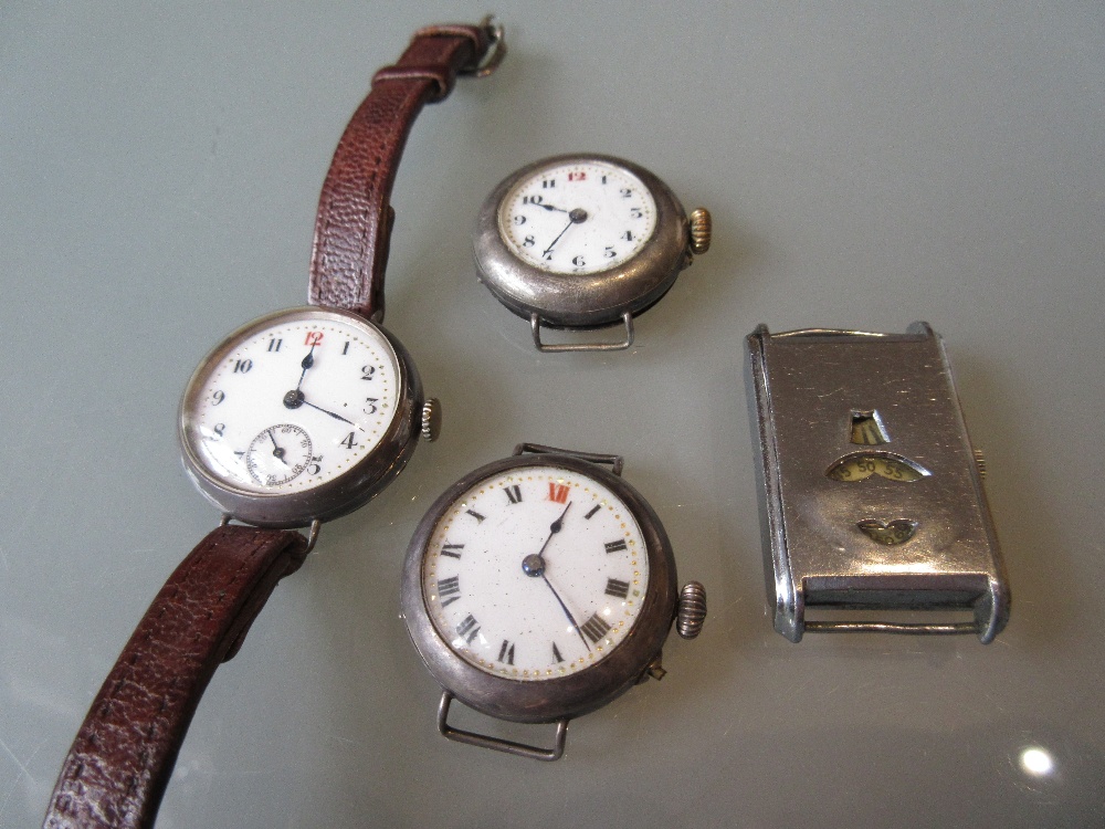 Three silver cased wristwatches (at fault), together with a rectangular steel wristwatch (at fault)