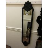Pair of modern narrow black and mirrored glass wall mirrors with floral etched borders and