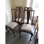 Set of four 20th Century mahogany Queen Anne style dining chairs having floral upholstered drop-in