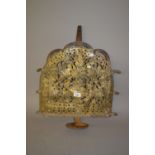 Antique pierced and repousse decorated brass and steel lamp bracket with oil tray decorated with