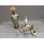 Nao matt glazed figure of a West Indian girl carrying a basket of fruit, a Lladro figure of Don