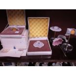 Four miniature Lladro models of lace bonnets, two boxed and two with display stands, another (at
