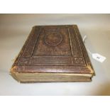 19th Century leather bound photograph album containing a quantity of Victorian photographs (at