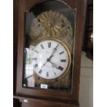 19th Century French comtoise longcase clock, the grained pine case enclosing an embossed brass and
