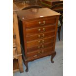 Mahogany six drawer music cabinet