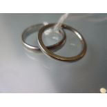 Two platinum wedding bands 8g