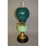 Victorian green opaque glass and brass oil lamp