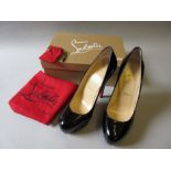 Christian Louboutin, pair of black patent leather Bianca 140 platform shoes, with one original