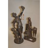 19th Century dark patinated spelter figure of a girl with a tambourine and putto playing a pipe,