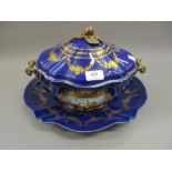 Modern floral decorated blue pottery tureen with cover and stand and metal handles