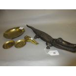 Patinated metal nutcracker in the form of an alligator, a brass nutcracker in the form of a pair