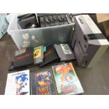 Nintendo NES games console together with a quantity of games and a quantity of Sega games