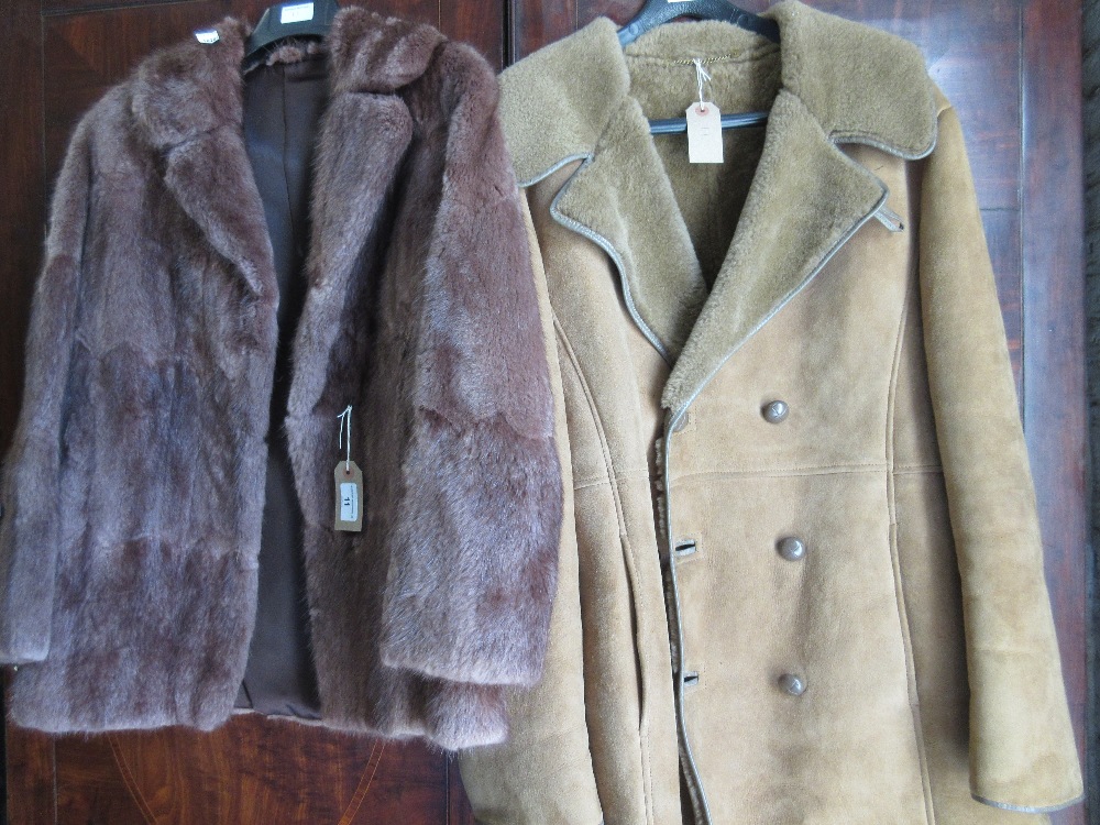 Ladies mid brown fur jacket, together with a sheepskin coat