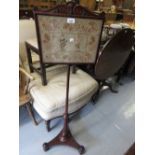 19th Century mahogany pole screen with a needlepoint panel and triform base