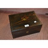 Victorian coromandel and brass inlaid fold-over writing slope with fitted interior and original