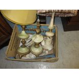 Pair of onyx gilt metal table lamps, an alabaster table lamp and two porcelain table lamps