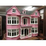 Large 20th Century double bay dolls house together with a large quantity of dolls house furniture