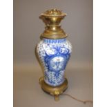 Continental pottery metal mounted table lamp decorated in blue and white