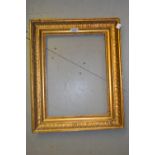 Rectangular gilt moulded composition picture frame, the aperture 14.5ins x 11ins together with a