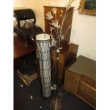 20th Century chrome floral design standard lamp and a modern floor standing lamp with linen