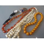 Agate bead necklace, an amber coloured bead necklace, simulated pearl necklace, two wristwatches and