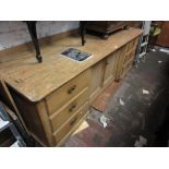 Large 19th Century stripped pine side cabinet with two centre panel doors flanked by six small