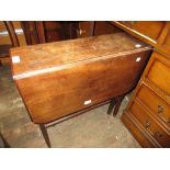 Edwardian mahogany Sutherland table on square tapering supports with brass and ceramic castors