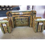 Art Deco green and yellow onyx cased mantle clock of rectangular form, the gilt dial with Arabic