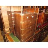 Two 20th Century mahogany military style brass mounted bedside cabinets