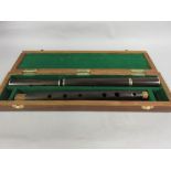 Rosewood four section flute in later fitted box No manufacturers marks. The cork tenons are