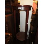 Mahogany two tier torchere stand on square tapering splayed supports, 13.5ins diameter