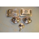 Silver plated entree dish, pair of serving dishes and a condiment set on tray