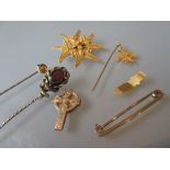 9ct Gold tie-pin, a Maltese cross brooch, Maltese cross stick pin, two other stick pins, a cross