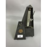 Black toleware metronome, ' The Mayfair ' by A.W. and Co.