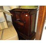 19th Century Singer sewing machine in reproduction mahogany cabinet on castors