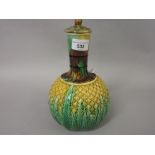 Late 19th Century Continental Majolica carafe in the form of a pineapple (having chip to cover), 9.