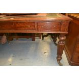 Victorian mahogany library table, the green tooled leather inset top above three frieze drawers