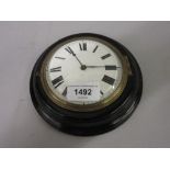 George III circular ebonised Sedan clock, the enamel dial with Roman numerals, the single train